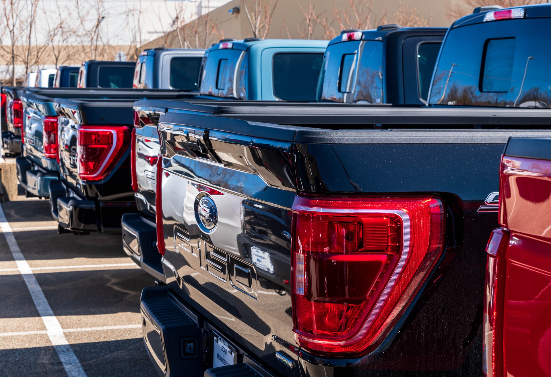 Ford F150 pickup trucks at a dealership